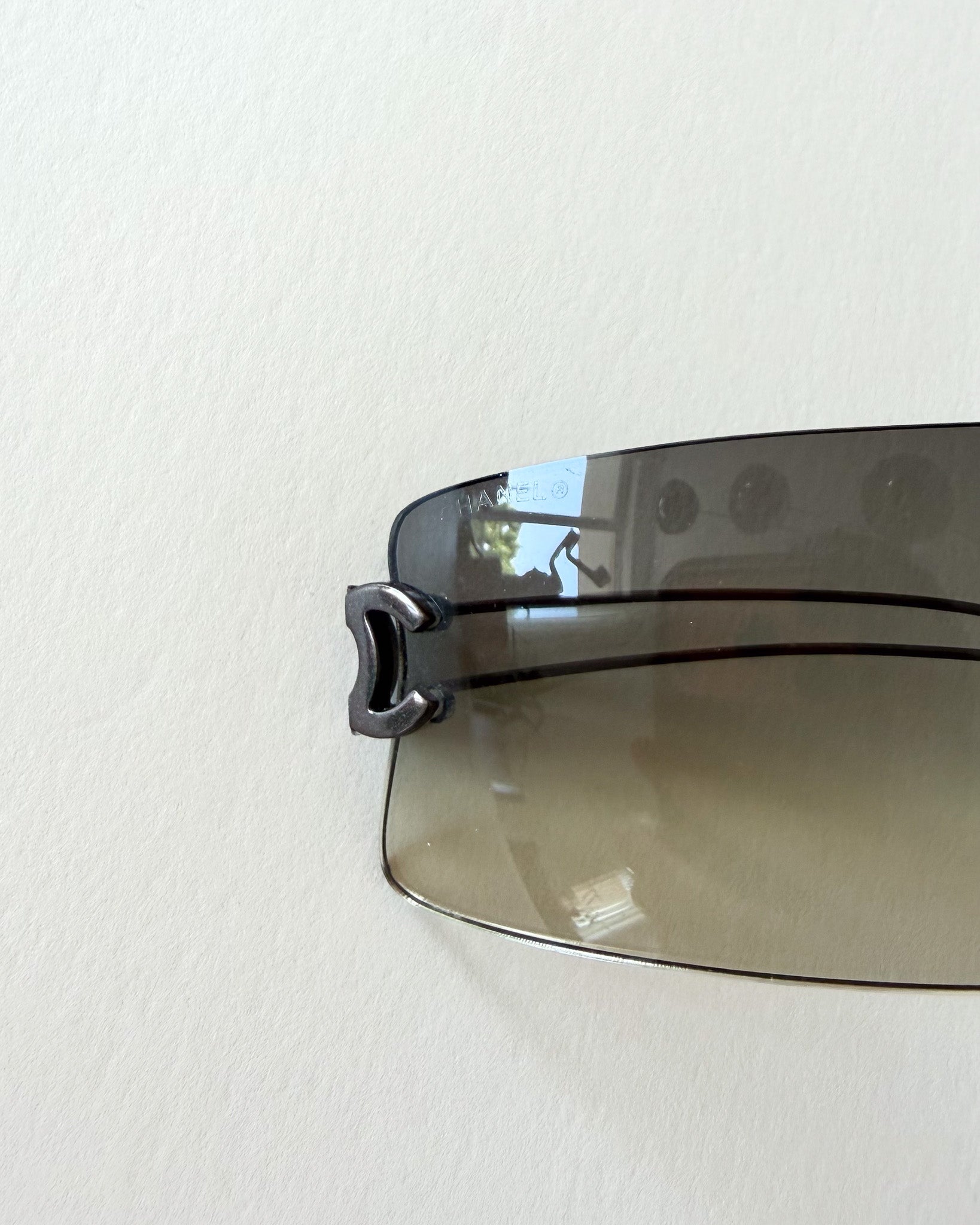Lunettes Chanel Y2K sans monture – grises, logo CC, ère Karl Lagerfeld