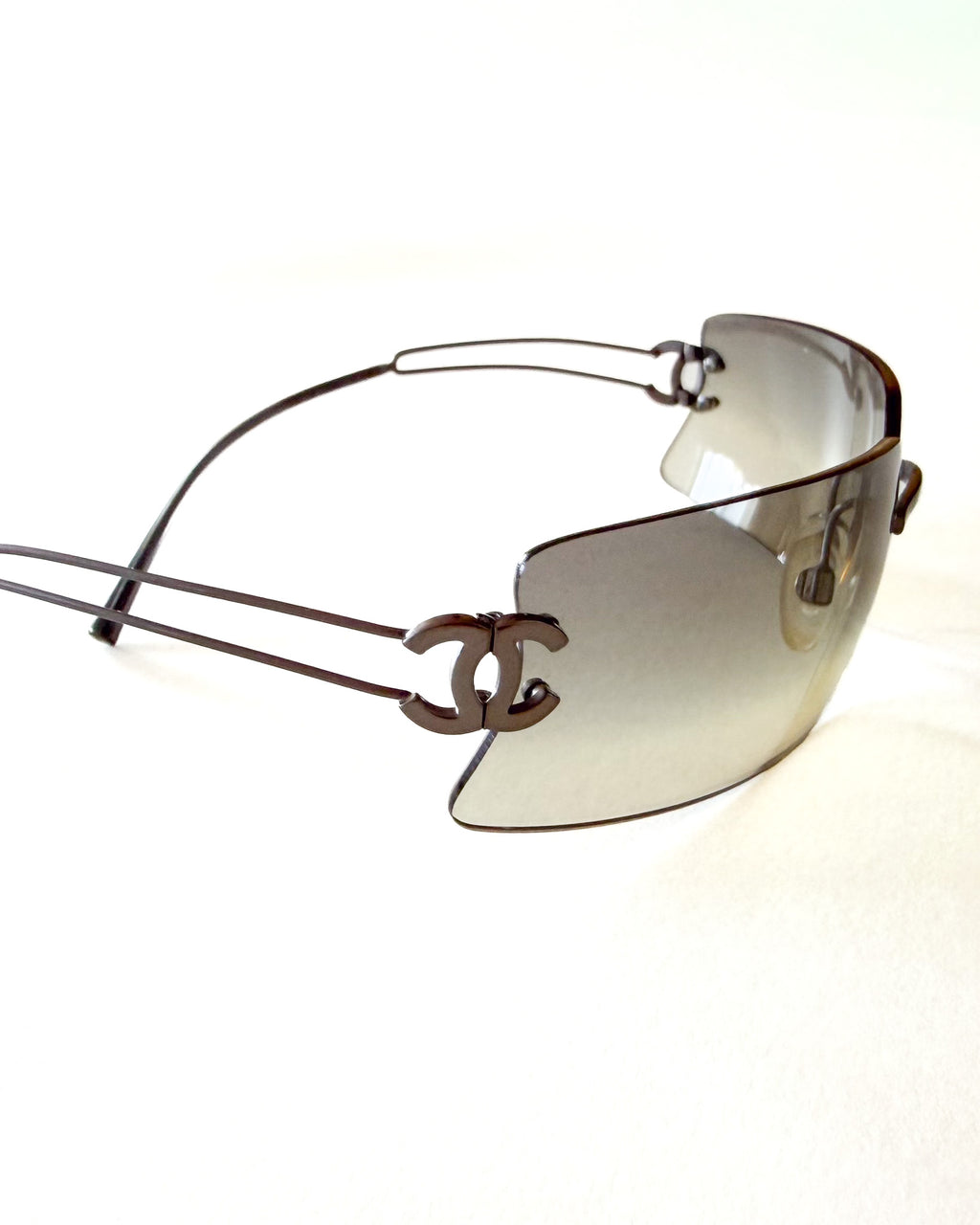 Lunettes Chanel Y2K sans monture – grises, logo CC, ère Karl Lagerfeld