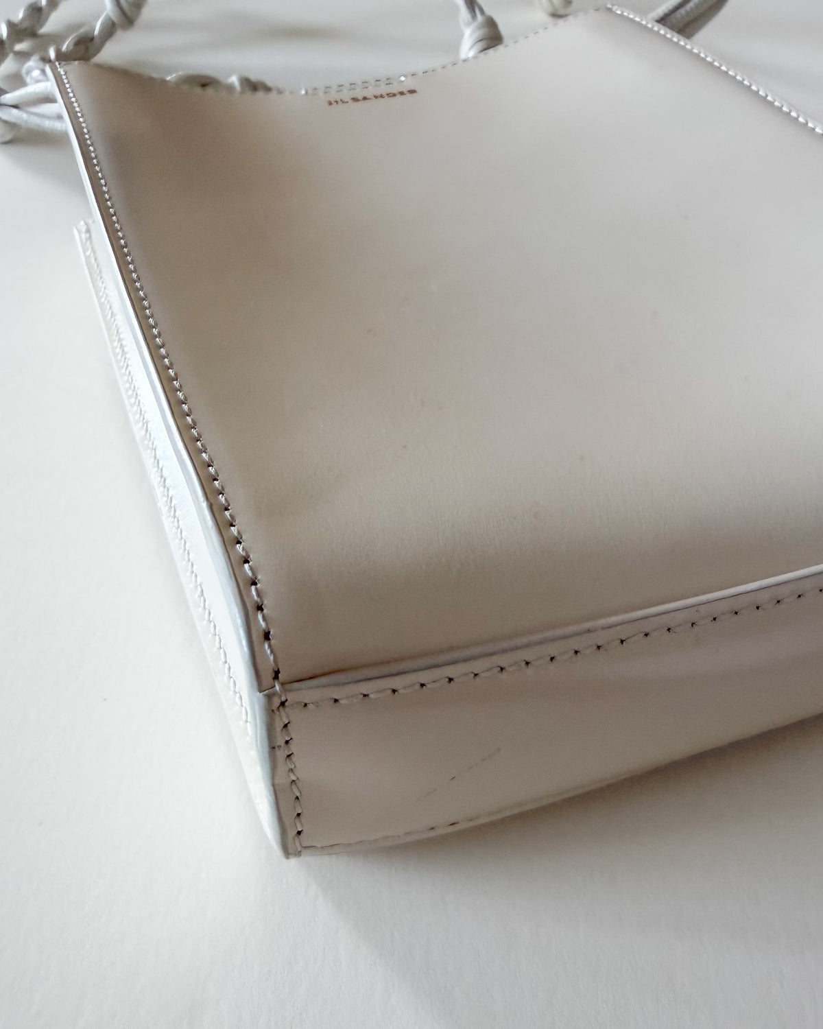 Torebka Jil Sander Tangle Small – biała skóra, wiązany pasek
