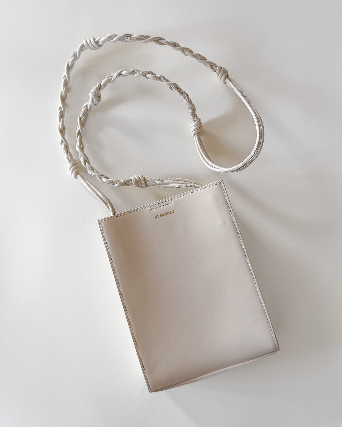 Sac Jil Sander Tangle Small – cuir blanc, bandoulière nouée à la main